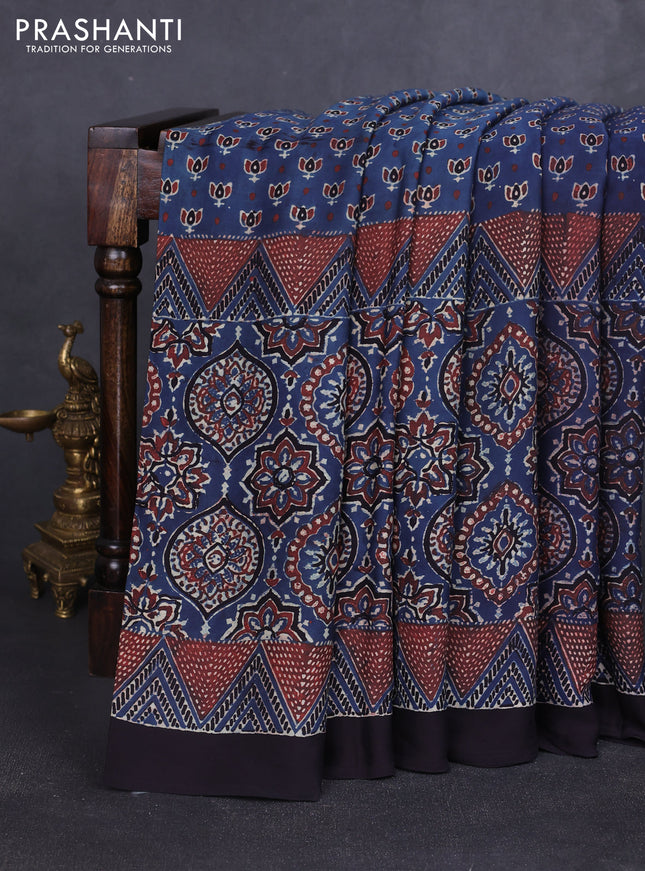 Modal silk saree blue and black with allover ajrakh prints and printed border