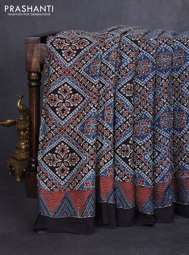 Modal silk saree blue and black with allover ajrakh prints and printed border