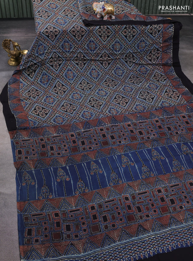 Modal silk saree blue and black with allover ajrakh prints and printed border