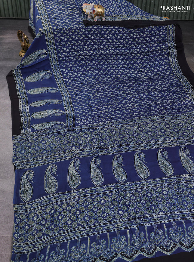 Modal silk saree blue and black with allover ajrakh prints and printed border