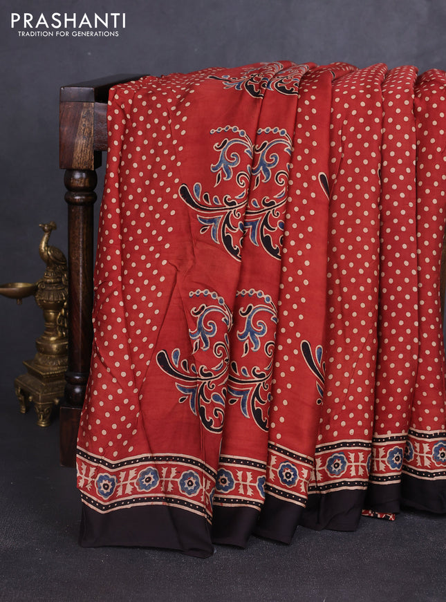 Modal silk saree rustic orange and coffee brown with allover ajrakh prints and printed border