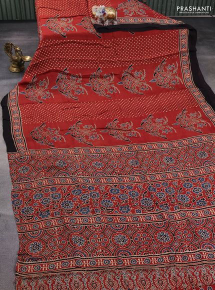 Modal silk saree rustic orange and coffee brown with allover ajrakh prints and printed border