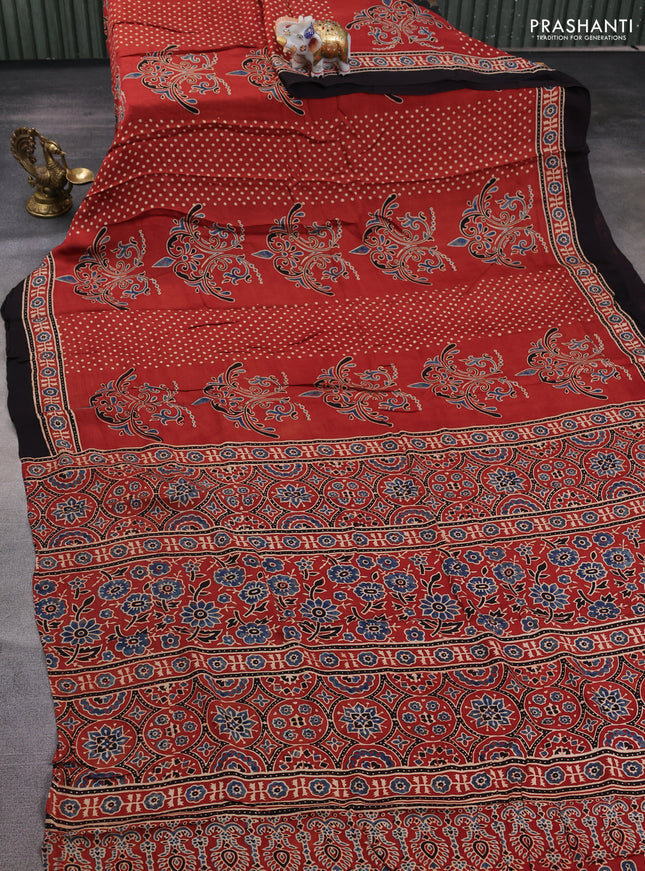 Modal silk saree rustic orange and coffee brown with allover ajrakh prints and printed border