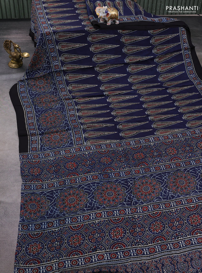Modal silk saree blue and black with allover ajrakh prints and printed border