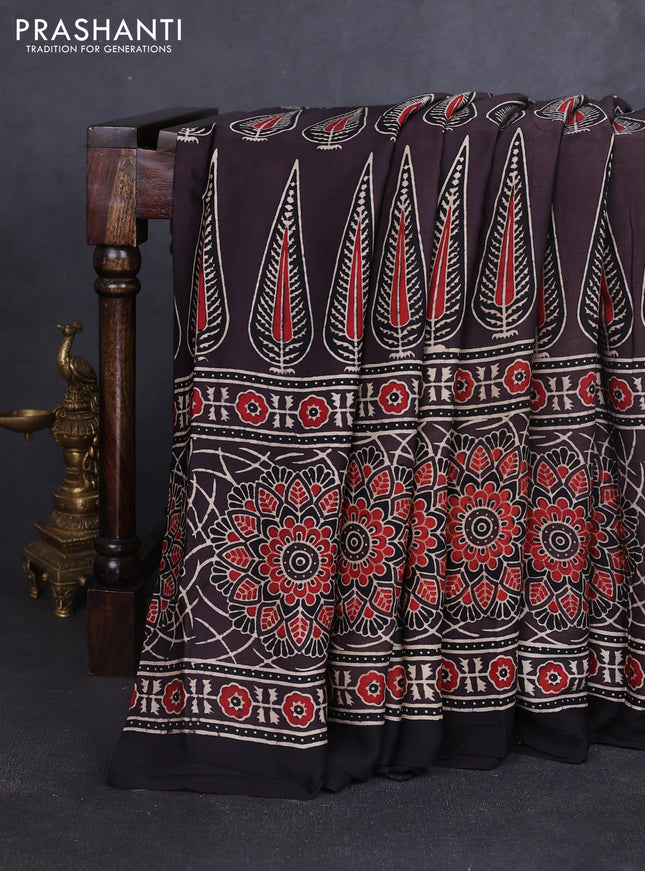 Modal silk saree brown and black with allover ajrakh prints and printed border