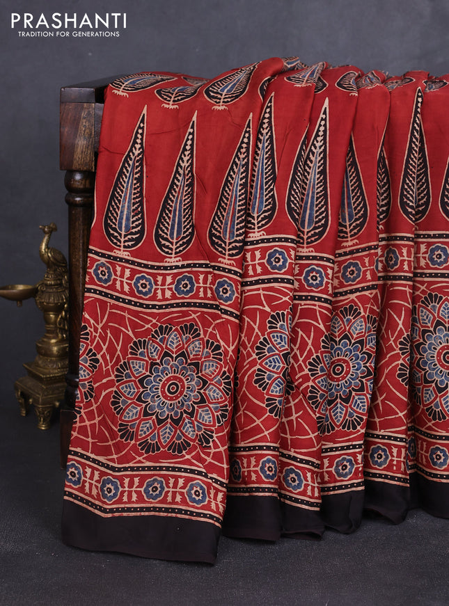 Modal silk saree rustic orange and coffee brown with allover ajrakh prints and printed border