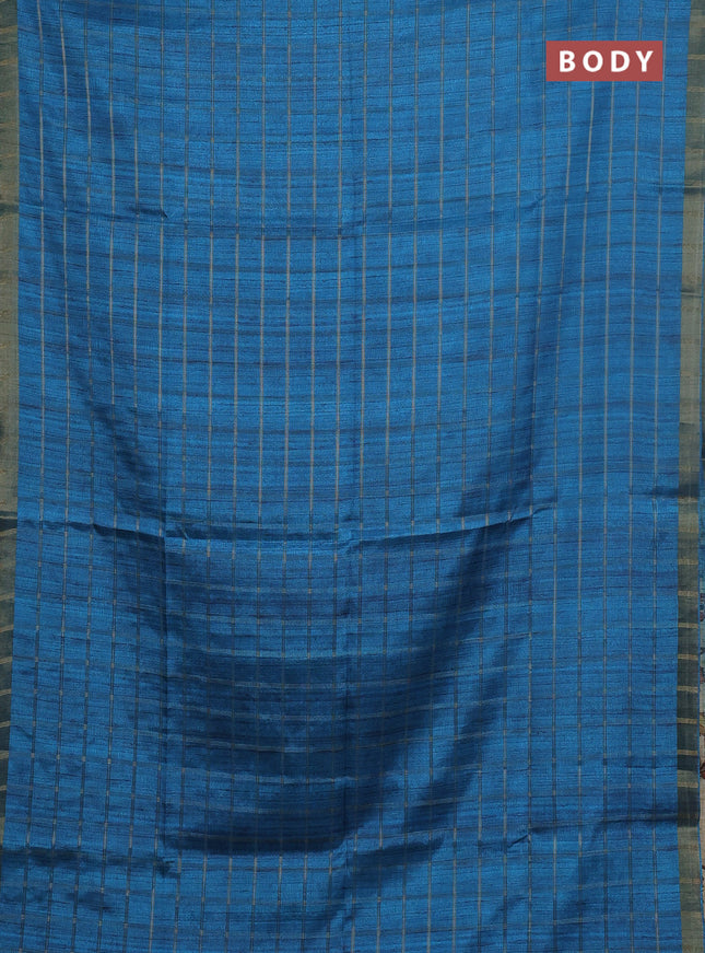 Semi tussar saree cs blue and beige with allover zari checked pattern and kalamkari printed pallu