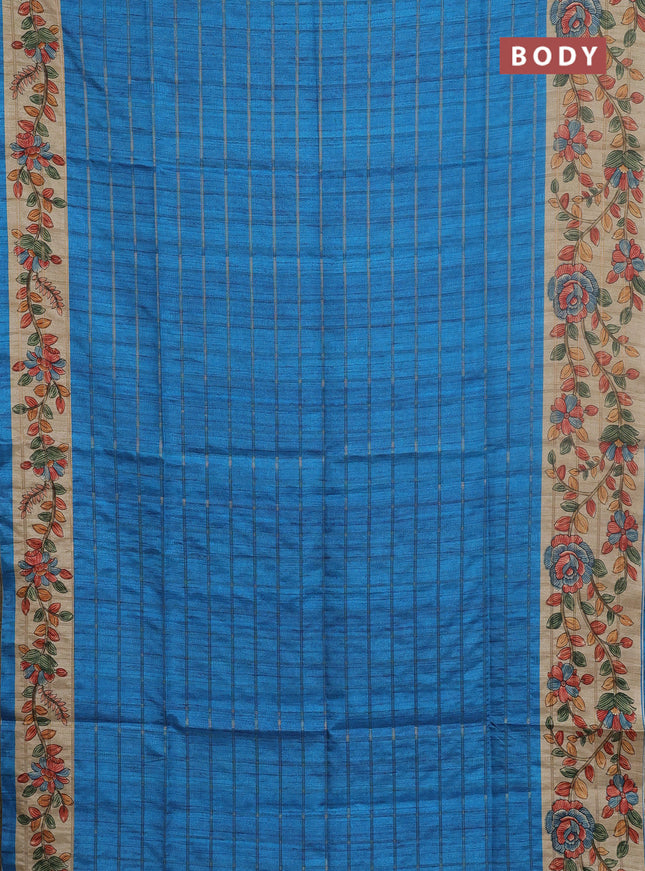 Semi tussar saree cs blue and beige with allover zari checked pattern and kalamkari printed pallu