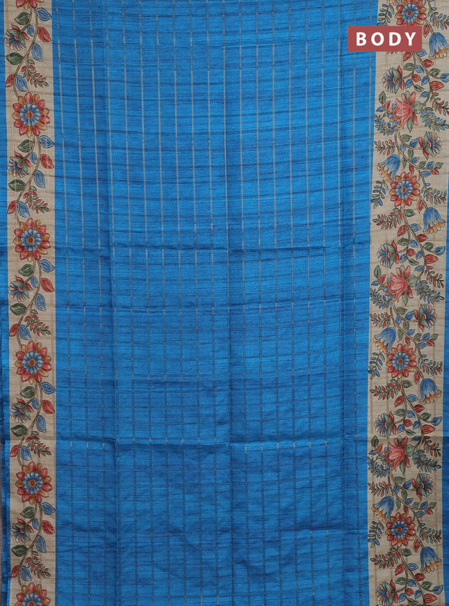 Semi tussar saree cs blue and beige with allover zari checked pattern and kalamkari printed pallu