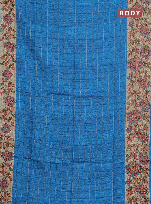Semi tussar saree cs blue and beige with allover zari checked pattern and kalamkari printed pallu