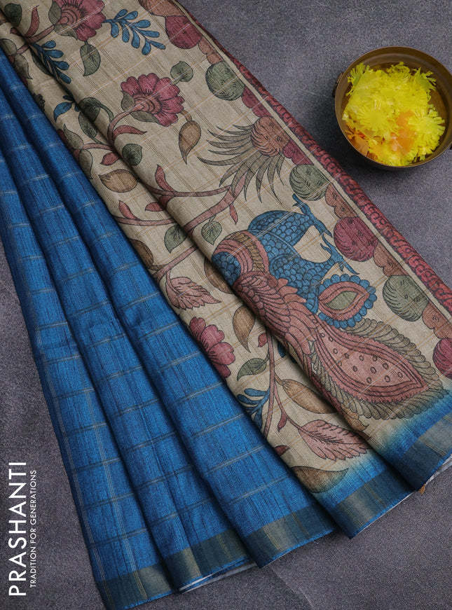 Semi tussar saree cs blue and beige with allover zari checked pattern and kalamkari printed pallu