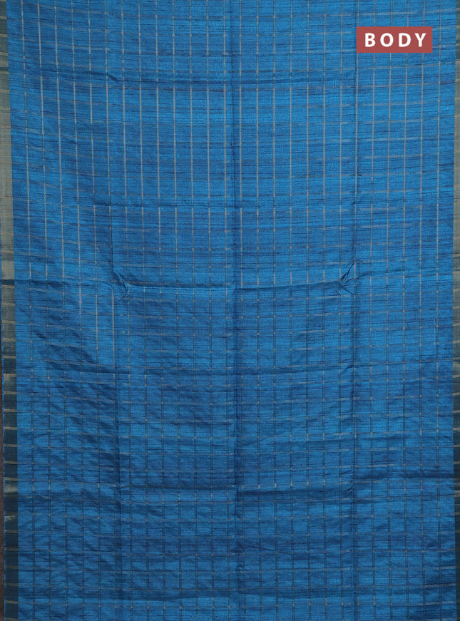 Semi tussar saree cs blue and beige with allover zari checked pattern and kalamkari printed pallu