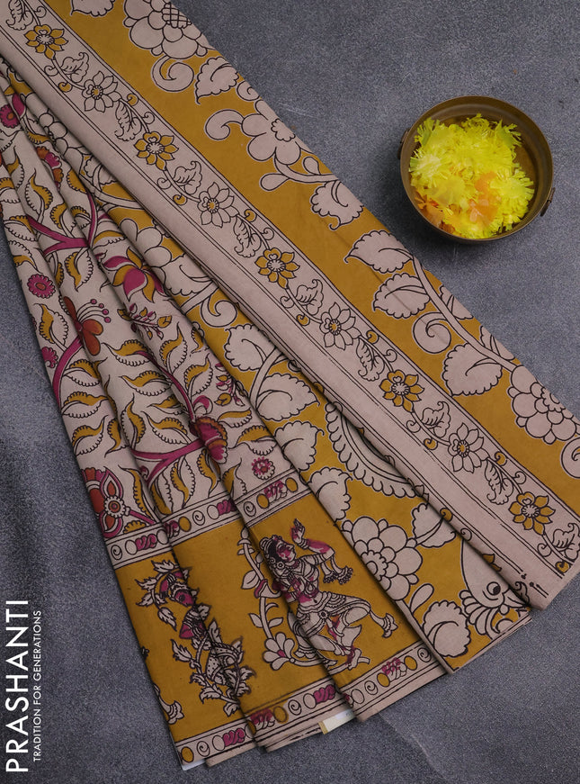 Kalamkari cotton saree beige and yellow with allover prints and printed border