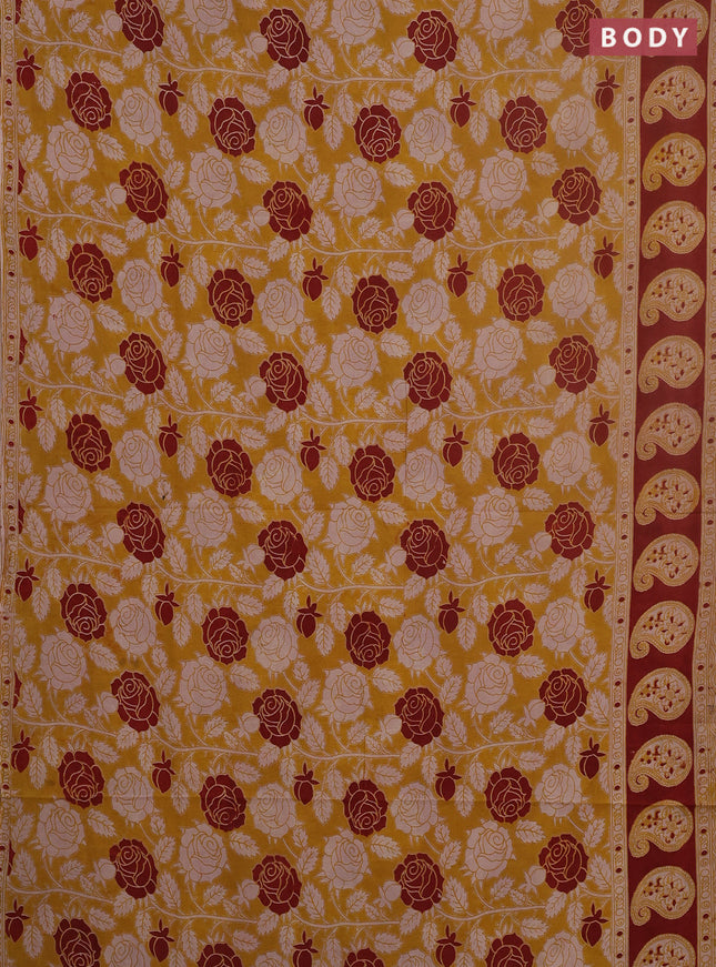 Kalamkari cotton saree yellow and maroon with allover prints and printed border