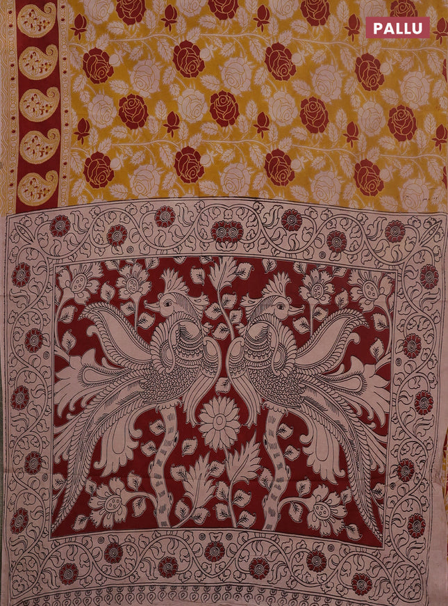 Kalamkari cotton saree yellow and maroon with allover prints and printed border
