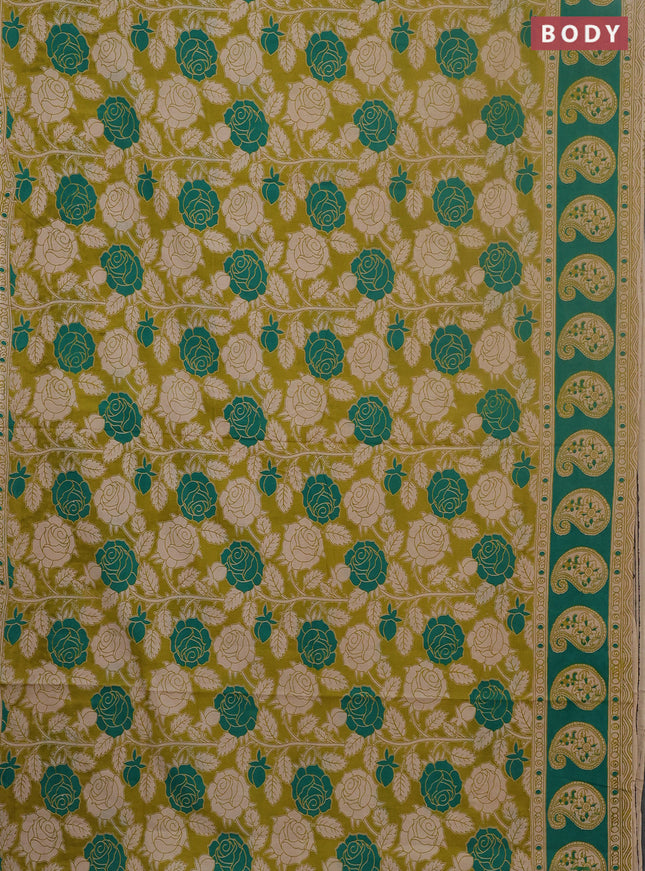 Kalamkari cotton saree light green and teal green with allover prints and printed border