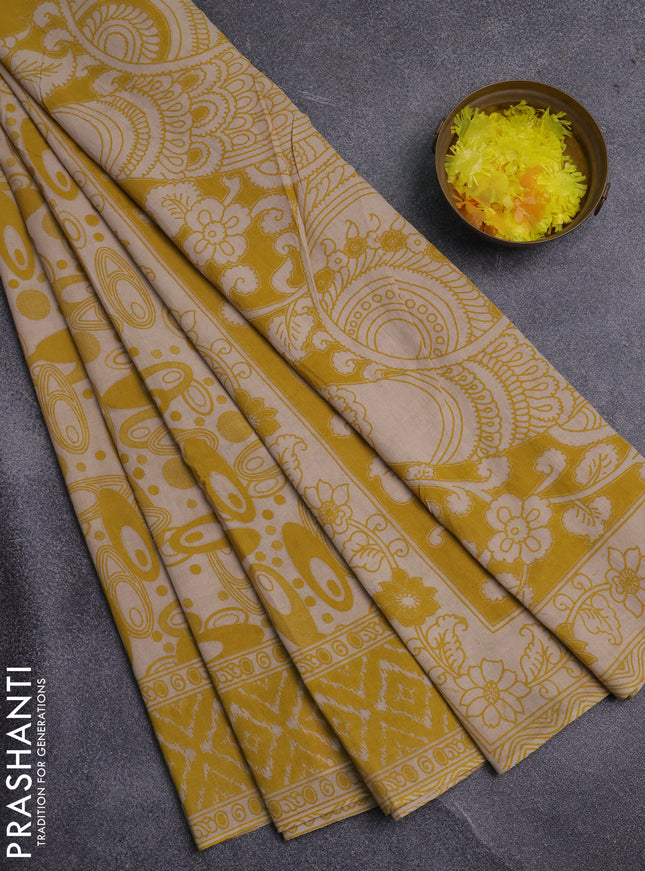 Kalamkari cotton saree yellow and beige with allover geomatric prints and printed border