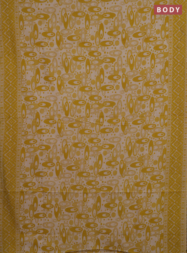 Kalamkari cotton saree yellow and beige with allover geomatric prints and printed border