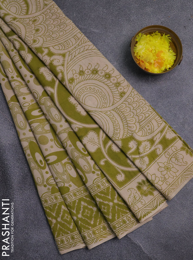 Kalamkari cotton saree light green and beige with allover geomatric prints and printed border