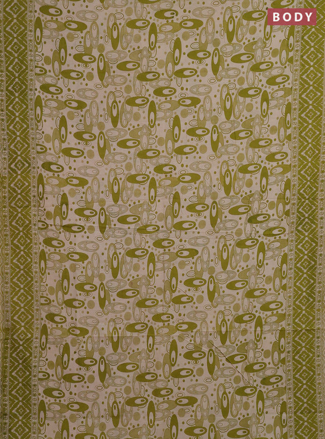Kalamkari cotton saree light green and beige with allover geomatric prints and printed border