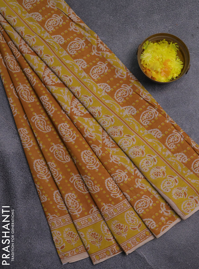 Kalamkari cotton saree mustard yellow and beige with allover paisley prints and printed border