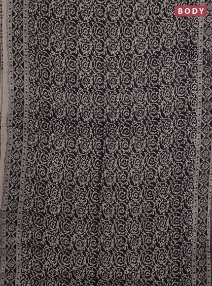 Kalamkari cotton saree black and beige with allover batik prints and printed border