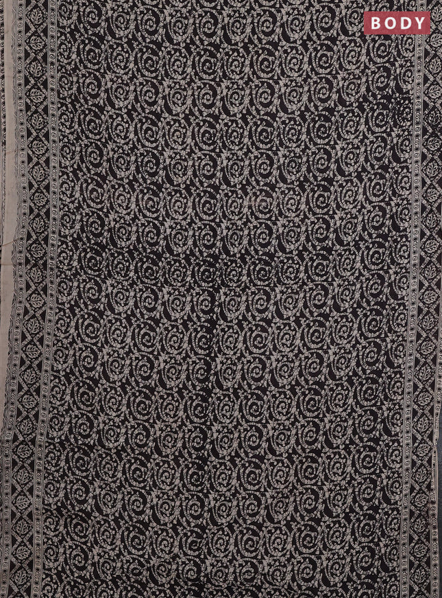 Kalamkari cotton saree black and beige with allover batik prints and printed border