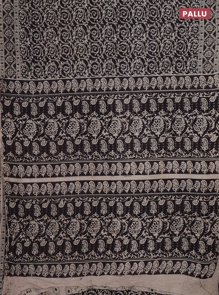 Kalamkari cotton saree black and beige with allover batik prints and printed border