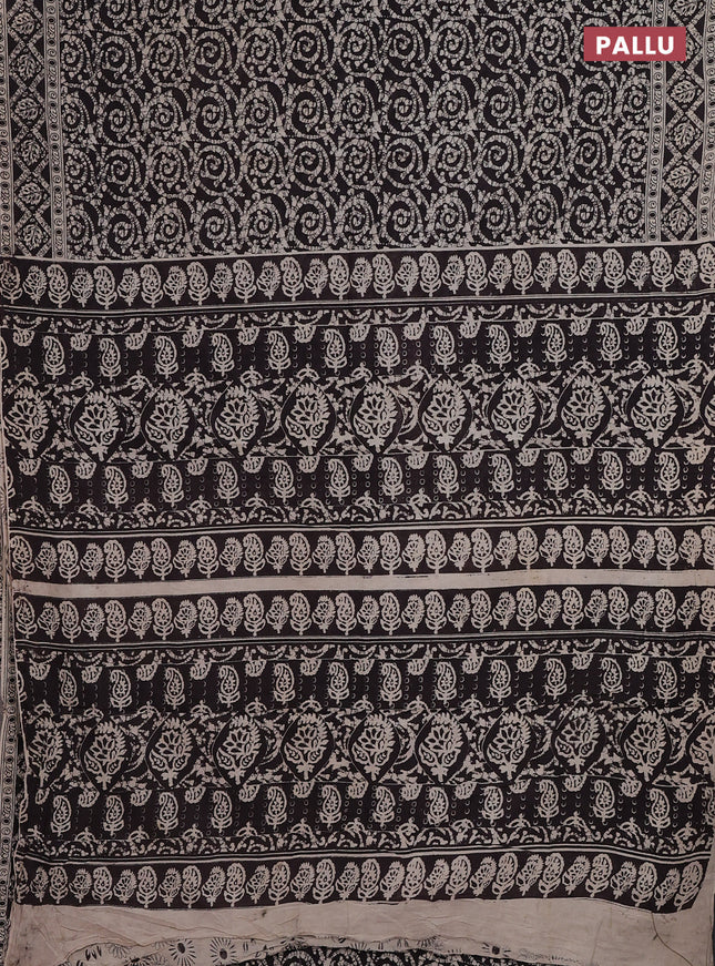 Kalamkari cotton saree black and beige with allover batik prints and printed border