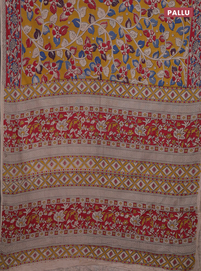 Kalamkari cotton saree mustard yellow and red with allover prints and printed border