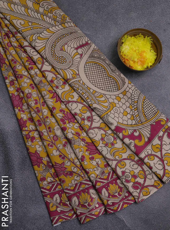 Kalamkari cotton saree yellow and pink with allover prints and printed border