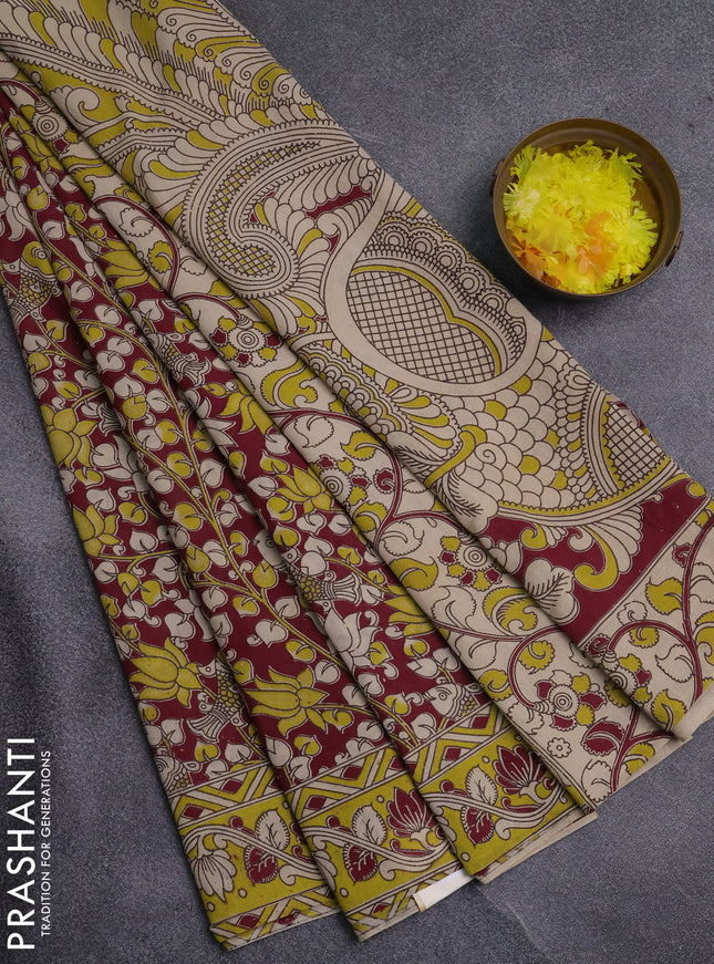 Kalamkari cotton saree wine shade and light green with allover prints and printed border