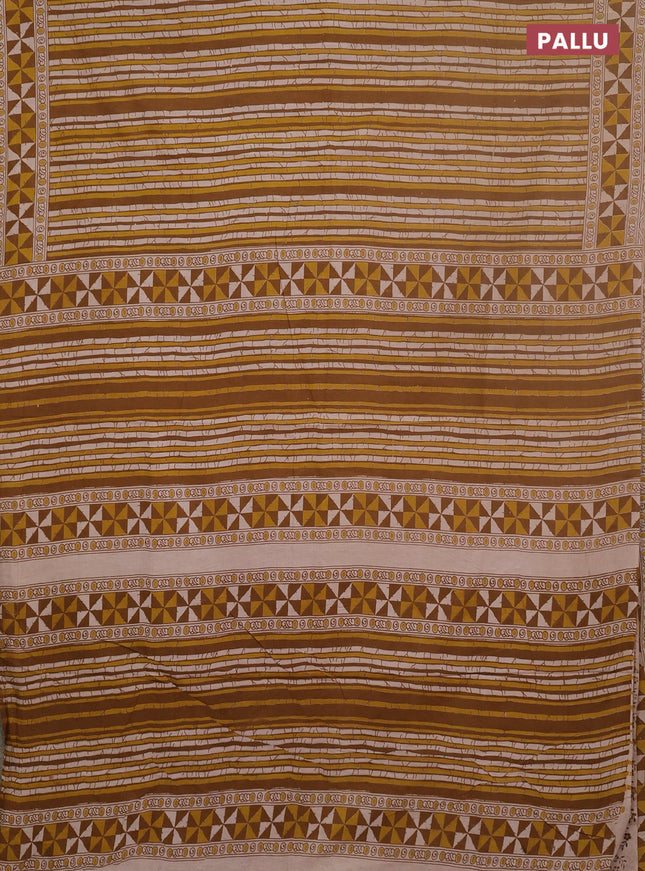 Kalamkari cotton saree dark mustard and yellow with allover prints and printed border