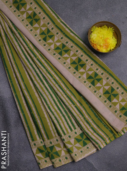 Kalamkari cotton saree light green and green with allover prints and printed border
