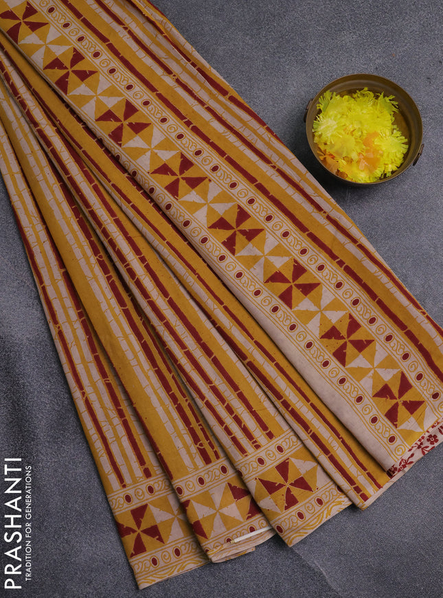 Kalamkari cotton saree yellow and maroon with allover prints and printed border
