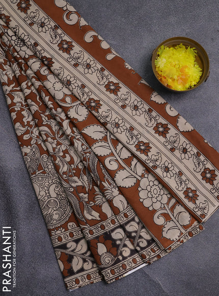 Kalamkari cotton saree dark mustard and black with allover prints and printed border
