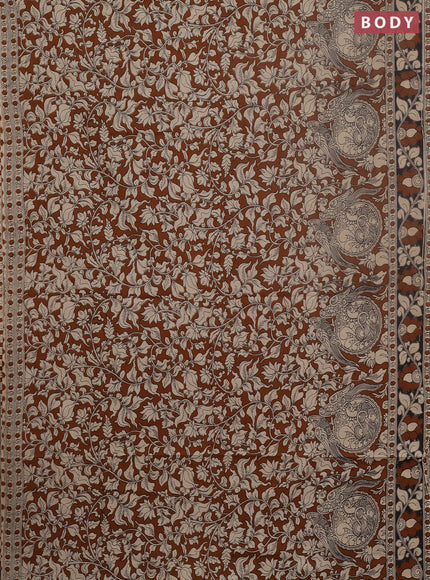 Kalamkari cotton saree dark mustard and black with allover prints and printed border