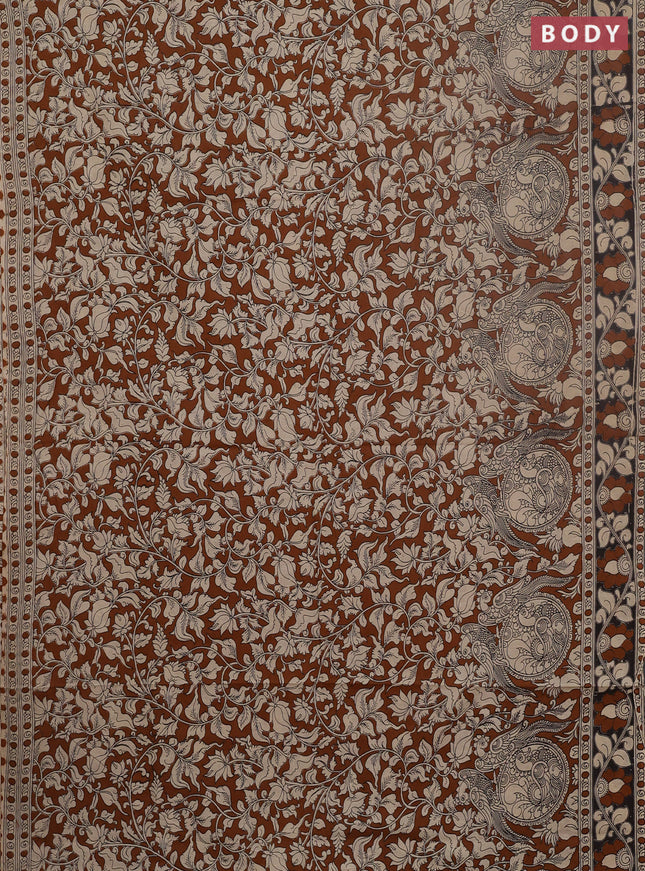 Kalamkari cotton saree dark mustard and black with allover prints and printed border