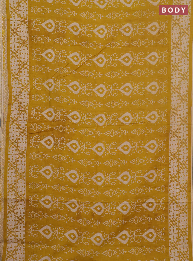 Kalamkari cotton saree yellow and beige with allover ikat prints and printed border