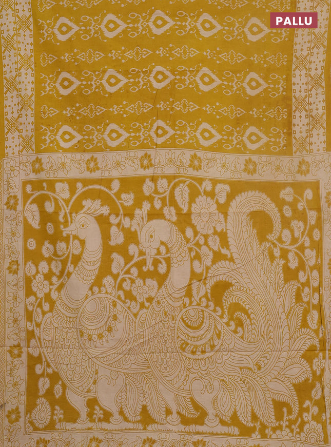 Kalamkari cotton saree yellow and beige with allover ikat prints and printed border