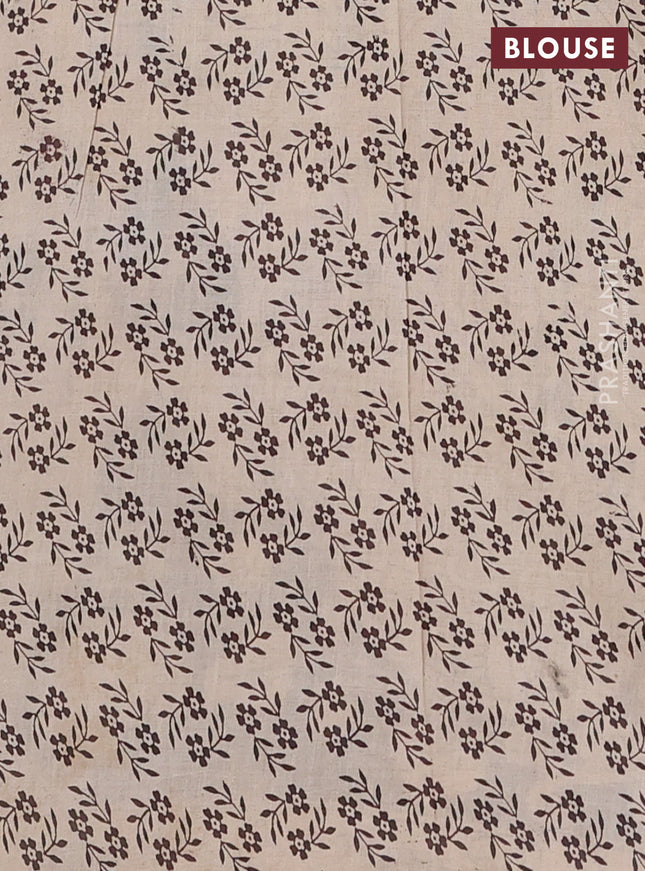 Kalamkari cotton saree black and beige with allover ikat prints and printed border
