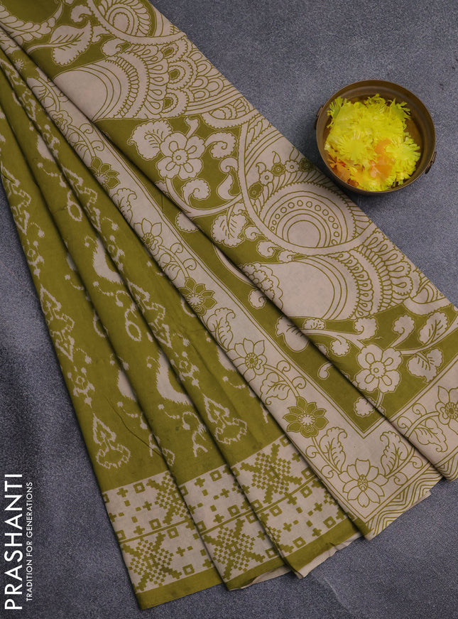 Kalamkari cotton saree light green and beige with allover ikat prints and printed border