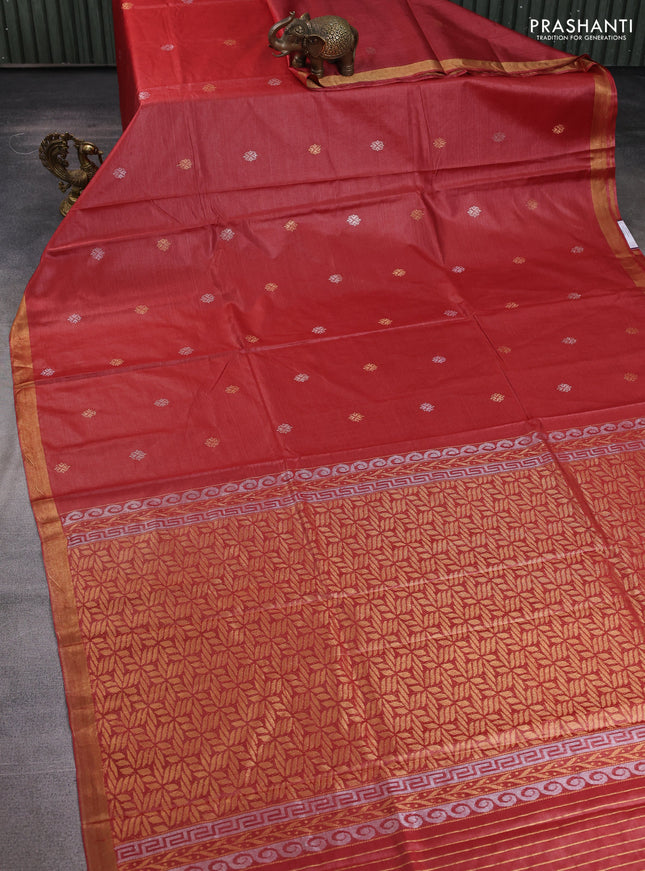 Banana silk saree rust shade with allover zari woven buttas and zari woven border