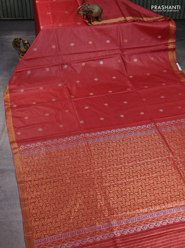Banana silk saree rust shade with allover zari woven buttas and zari woven border