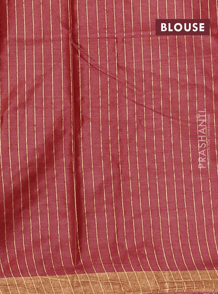 Banana silk saree rust shade with allover zari woven buttas and zari woven border