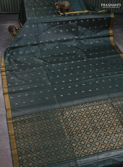 Banana silk saree dark green with allover zari stripe & buttas and zari woven border