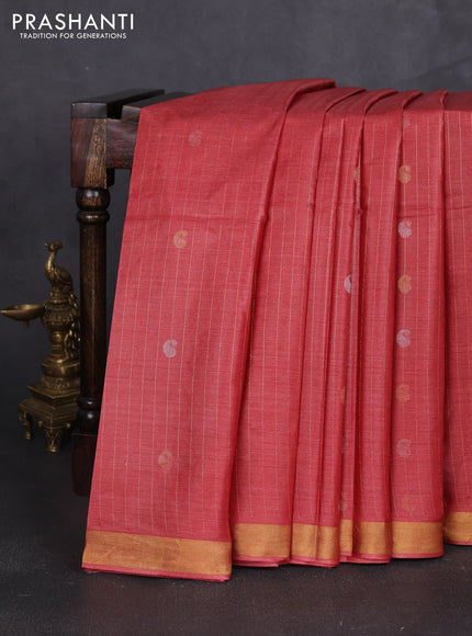 Banana silk saree rust shade with allover zari stripe & buttas and zari woven border