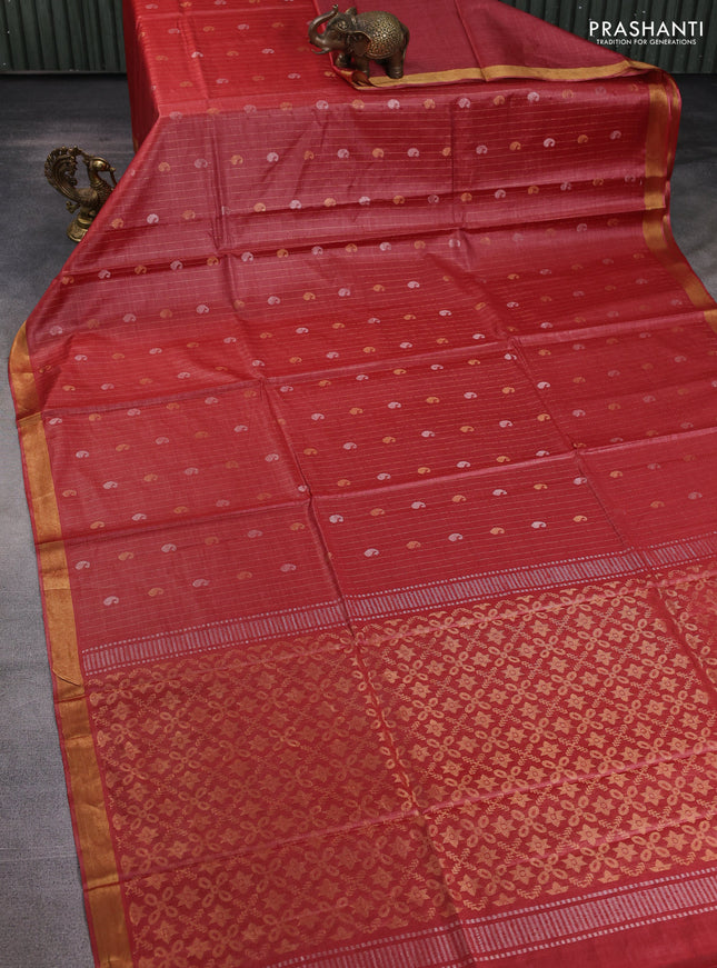 Banana silk saree rust shade with allover zari stripe & buttas and zari woven border