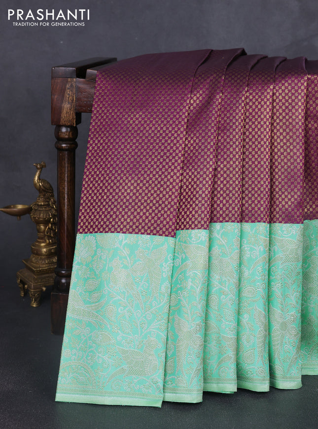 Pure kanchipuram silk saree purple and teal with allover zari woven paisley brocade weaves and long zari woven brocade border
