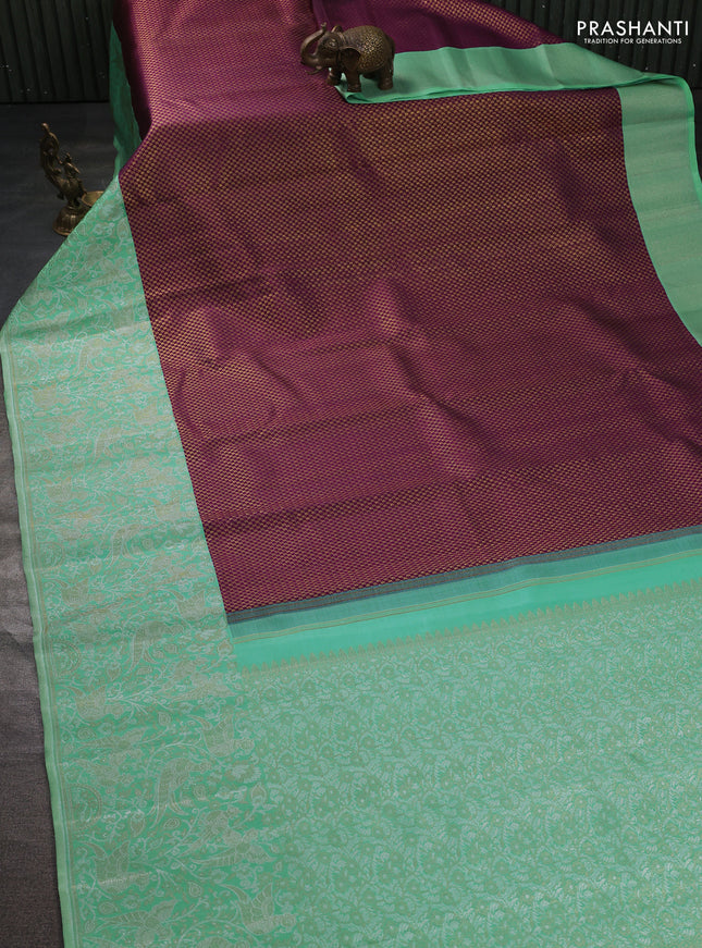 Pure kanchipuram silk saree purple and teal with allover zari woven paisley brocade weaves and long zari woven brocade border